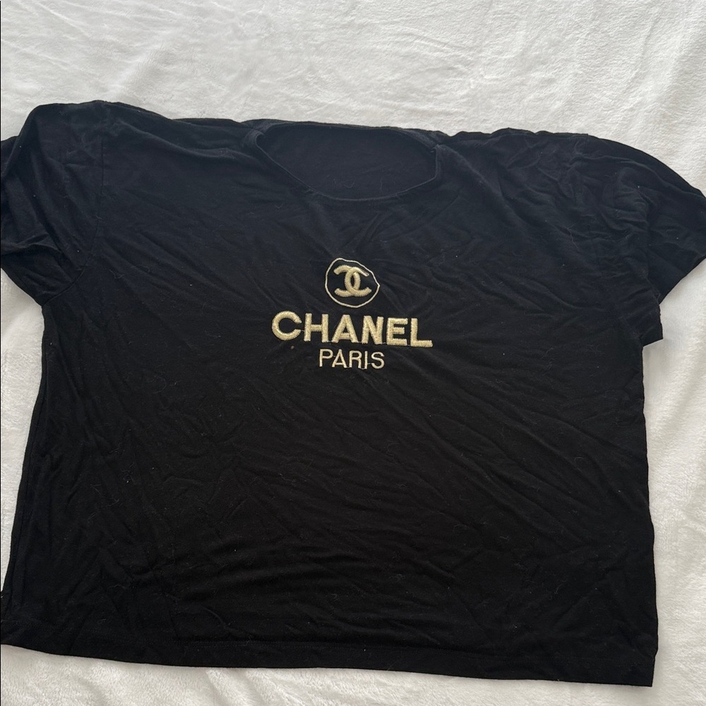 CHANEL Black Tee with Gold Emblem